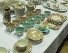 Twentieth century Poole pottery part coffee service, Royal Doulton "Azalea" six square saucers and