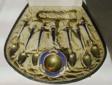 Norwegian enamelled silver set of teaspoons, strainer and sugar nips, all with Art Nouveau style