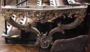 Eighteenth century Louis XV style giltwood and marble console table, with pierced ornate foliate