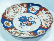 Two Japanese Imari plates and Chinese blue and ironstone red circular plate (4)