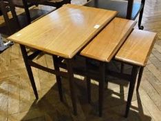 1960s/70s mahogany nest of trio coffee tables, rectangular with cavetto edge, on turned tapering