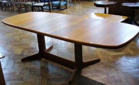 1970s teak style wood rounded edged rectangular extending dining table, on splayed style supports