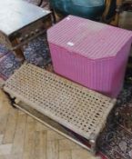 Lloyd loom laundry basket, painted maroon, and a wicker footstool, (2)