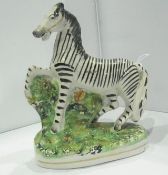 Staffordshire pottery zebra,  17cm high