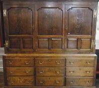 George III oak press cupboard, with ogee and dentil cornice, the interior with later hanging rail