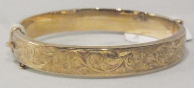 9ct gold bangle, scroll engraved, approximately 13.8grams