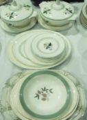 Bristol pottery part dinner service, decorated with stylised flowers, marked 1699 to base and