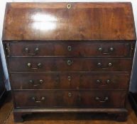 Late Georgian mahogany bureau, the fall-front opening to reveal drawers and pigeon hole, four long