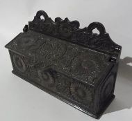 Antique oak carved candle or spiced box, possibly seventeenth century, shaped raised back, heart