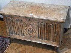 Modern oak chest, with carved front panel, 82cm wide