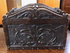 Renaissance style oak magazine rack, foliate scroll carved, 43cm wide