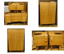 1970s light teak effect wood bedroom suite, viz:- dressing table, two bedside cupboards and two