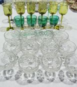 Set of six etched and coloured glass hocks, six green moulded stemmed wines, four green and clear