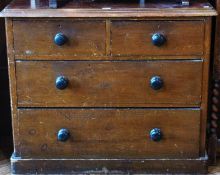 Victorian pine chest of two short and two long graduated drawers raised on a plinth base, with