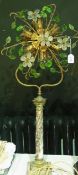 Green and clear glass and gilt metal, trailing flowerhead pattern and mounted on verigated marble