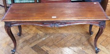 Early 19th century oak rectangular top occasional table, with moulded edge, on a foliate carved