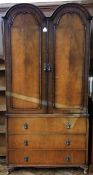 Twentieth century Queen Anne style walnut veneer wardrobe, the double domed top with a pair of