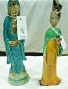 Pair of oriental pottery figures, one draped in blue glaze shawl (af), another possibly