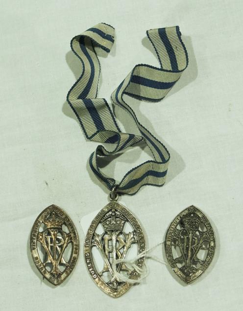 Queens Institute of District Nursing silver medal, with blue and white striped ribbon, Birmingham