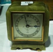 A twentieth century green onyx cased mantel clock with silver dial, by Elliott, supplied by J R