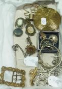 Quantity of costume jewellery, to include compact, silver-coloured bangle, buckle and brooches, (1