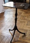 A Georgian style rectangular top side table, on turned column support, to tripod base with ball