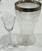 Mid 18th century opaque twist wine glass, with round funnel bowl, engraved with fruiting vine,