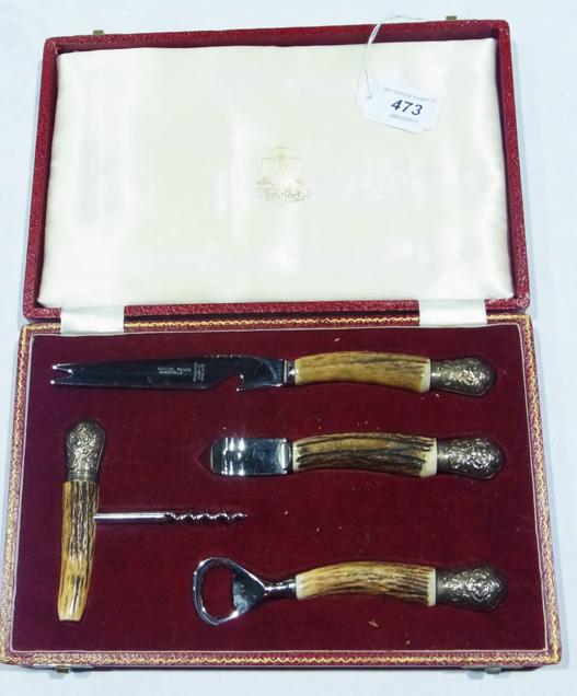 Samuel Peace horn-handled wine and cheese set, viz:- cheese knife, bottle opener and corkscrew,