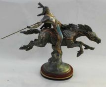 Painted spelter model of an Indian warrior on horseback, Frederick Remington style, the base stamped