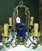 Wrought metal four-light electrolier with blue glass vase centrepiece and scroll branches, 40cm