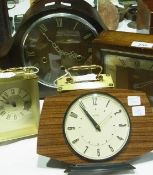 An oak domed case mantel clock with chiming movement, a Smiths Sectric oak cased mantel clock, two