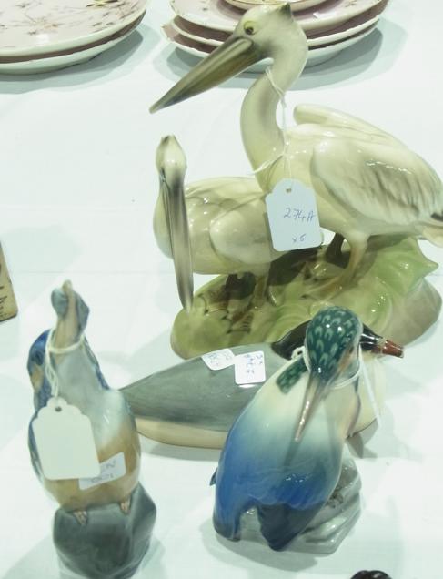 A small quantity of porcelain ornaments to include:- Austrian porcelain pelicans, Copenhagen
