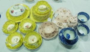 Part teaset yellow glazed with floral decoration supplied by T. Goode & Company comprising a