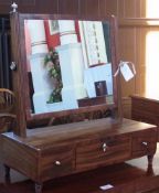 Early nineteenth century mahogany swing framed dressing table mirror, the rectangular plate with