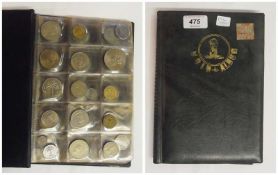 Accumulation of coins of the world in album, including Indonesia