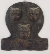 Salop Fire Office lead fire mark, decorated with three leopard heads, policy no. 2473, 19cm high