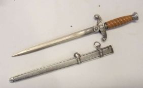German army style short ceremonial dagger with spirally wrythen orange plastic grip to hilt, the