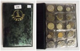 Album of coins of the world, including Britain, Australia and Olympic coins