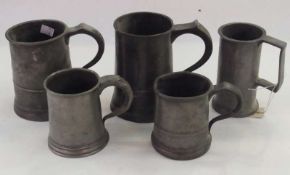 Nineteenth century pewter one quart tankard, with excise mark WXR, two pewter pints, with excise
