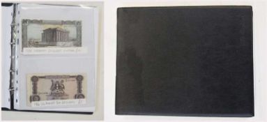 Album of notes containing Lebanon 1968 50 livres, Uganda 1966 10 shillings, 1991 1000 shillings,