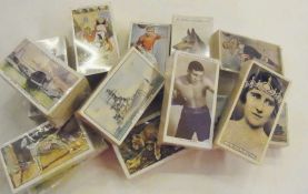 A large collection of cigarette cards to include:- "Empire Personalities", "Churchman Boxing