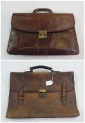 Leather briefcase, three sections with brass lock, and another similar briefcase