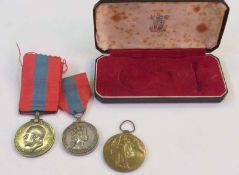 Two WWI medals to F. Barnes and a faithful service medal (all worn) in case
