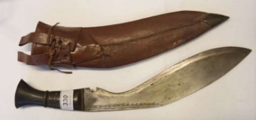 Kukuri Knife in brown leather scabbard with two smaller knifes, engraved decoration to blade with