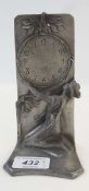 Art Nouveau pewter decorative stand, decorated girl holding clock face, mark to base GSW, EDLES