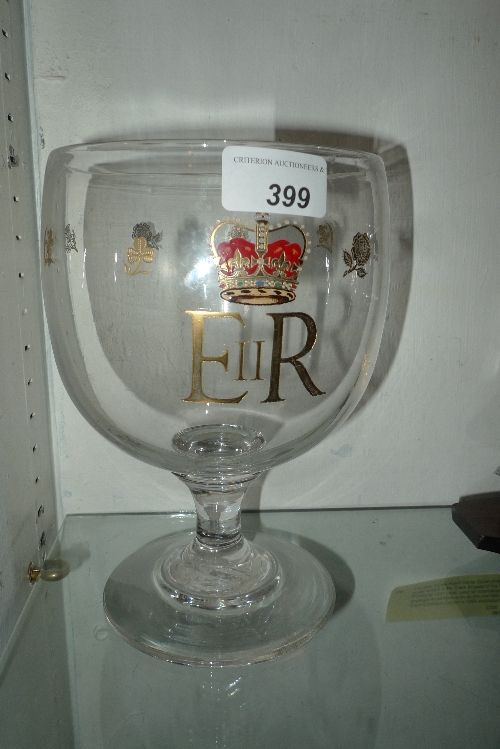 A large glass commemorative goblet produced for the 1953 Coronation with enamel decoration in