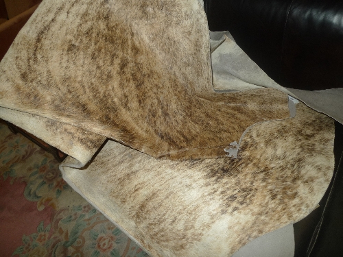 A cowhide rug L 226 cm