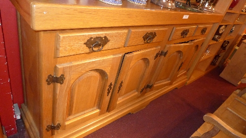 A French oak country farmhouse pantry cabinet the solid top above four drawers and arched panel