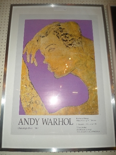 An Andy Warhol exhibition poster of a tattooed golden boy W 73 X H 103 cm