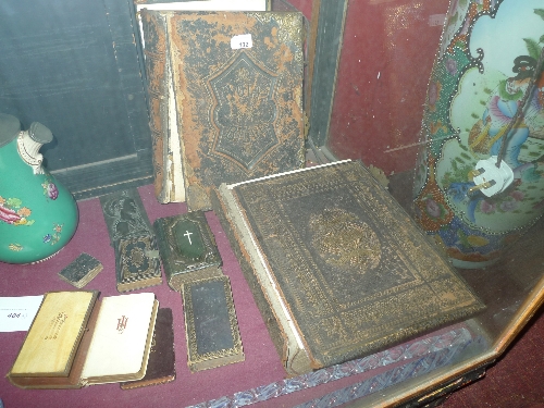 Two large Holy Bibles with illustrations together with various prayer books